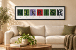 Personalised name satellite wall art in black frame hanging above sofa